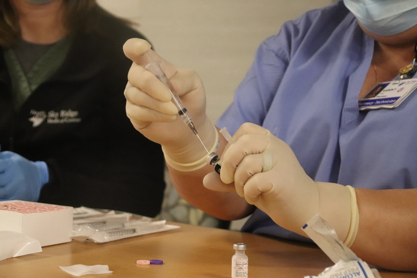 Each vial of the Pfizer COVID-19 vaccine is good for five doses. Sky Ridge Medical Center received 195 vials, or 975 doses, of the vaccine Dec. 15 and began inoculating hospital staff working closely with COVID-19 patients.